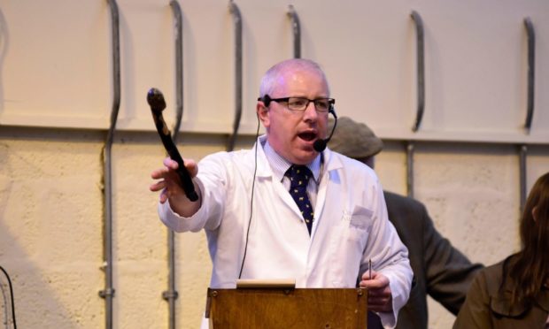 Donald Young in the rostrum at United Auctions' Huntly Mart.