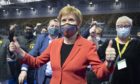 First Minister and SNP party leader Nicola Sturgeon celebrates after retaining her seat for Glasgow Southside.