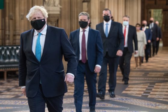 PM Boris Johnson and Labour leader Sir Keir Starmer on their way to hear the Queen's speech.