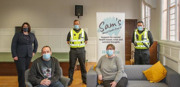 The opening was attended by (back Nicky Connor of Fife Health and Social Care Partnership, Inspector Paul Gillespie and Sergeant Craig Fyall, and (front) Ross Reilly and Susan Neilson from Sam's Cafe.