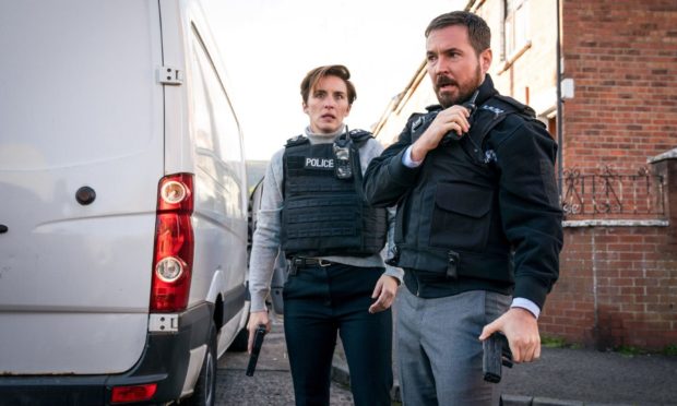 Vicky McClure as DI Kate Fleming and Martin Compston as DI Steve Arnott in Line of Duty.