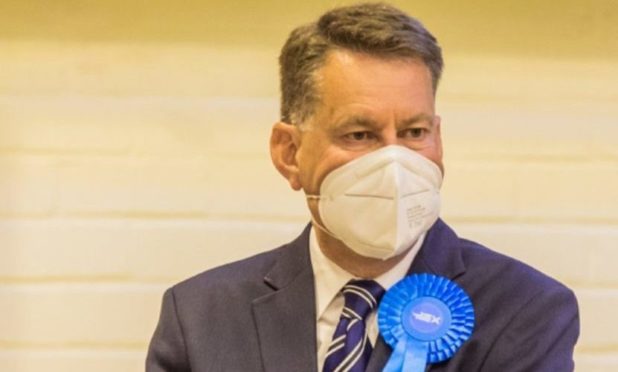 Murdo Fraser, pictured at the count in Perth on Friday, was returned on the Mid Scotland and Fife list.