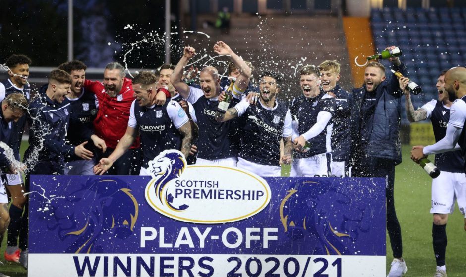 Dundee celebrate promotion at Rugby Park in 2021. Image: PA