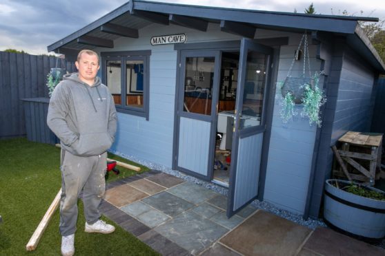 Barry Goodall at home in Mill O Mains after a burglar trashed his man cave and stole all the framed signed football shirts he had collected over the years in a raid at 2.30am - Steve Brown / DCT Media