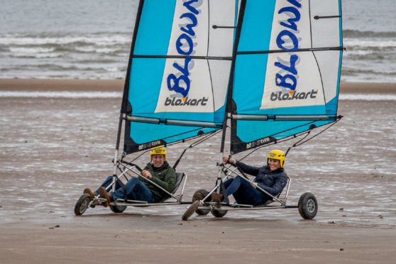 The Duke and Duchess showed their competitive side in the land yachting session.