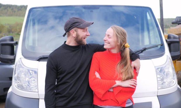 Alicia Storie and Hasse Simonsen with their van.