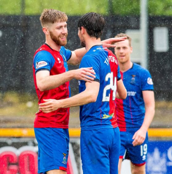 Shaun Rooney celebrating a goal for Inverness with his team mate Charlie Trafford