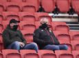 A familiar sight these last few months - a bemasked Warren Gatland watching a game, this time at Bristol...