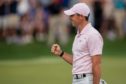 Rory McIlroy reacts after winning on the 18th hole at Quail Hollow.
