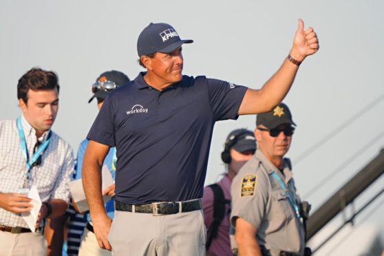 Phil saved his 1287th thumbs up of the weekend for when he went to collect the PGA Championship trophy.