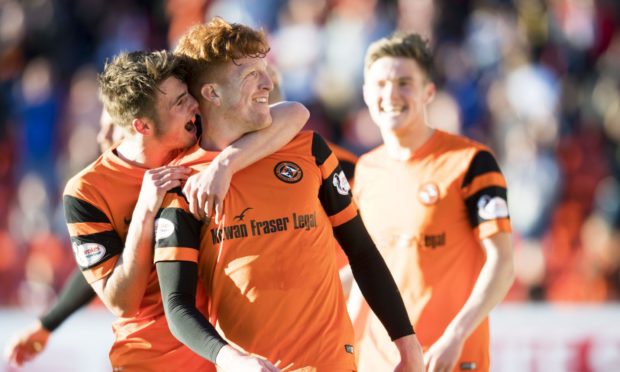 Simon Murray with Jamie Robson during his time at Dundee United.