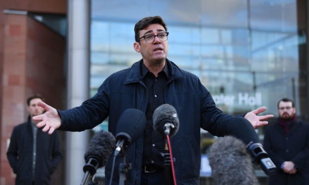 Andy Burnham, mayor of Greater Manchester, addresses the media