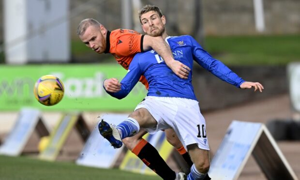 Dundee United defender Mark Connolly in action against St Johnstone's David Wotherspoon last season.