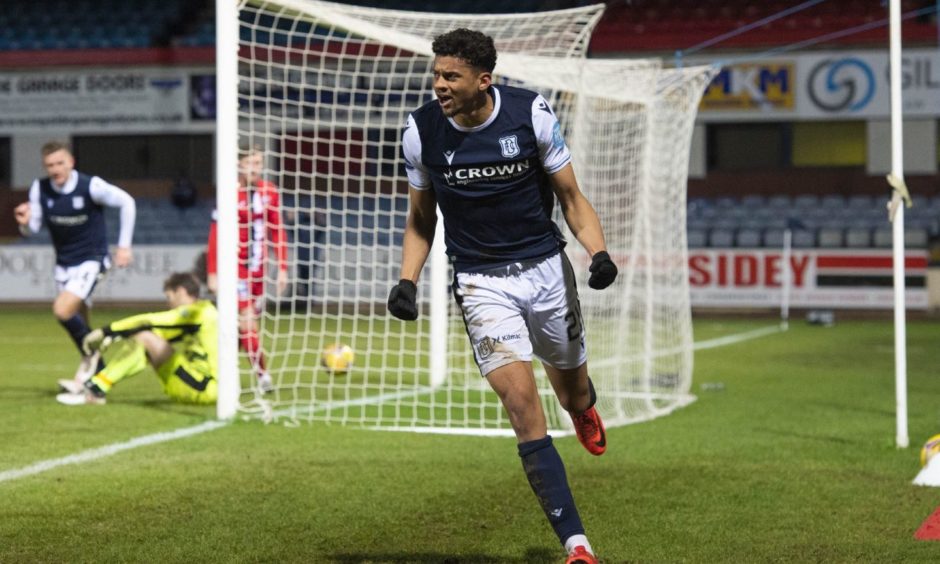 Osman Sow celebrates scoring for Dundee against Dunfermline. Image: SNS