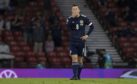 Goalscorer Callum McGregor reacts at the final whistle as Scotland lose 3-1.