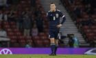 Goalscorer Callum McGregor reacts at the final whistle as Scotland lose 3-1.