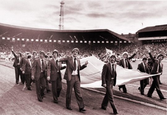 The Scotland squad perform a lap of honour around Hampden Park before flying to Argentina for the World Cup Finals.