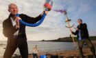 Richard Wemyss and Ellie Deas from the Cellardyke Sea Queen Festival join composer and instrument maker Graeme Leak play musical instruments made of beach rubbish