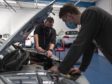 Students doing electric vehicle training at D&A College