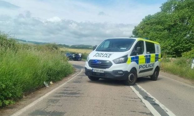 Police at the scene of the crash, near the Abercrombie junction on the B942