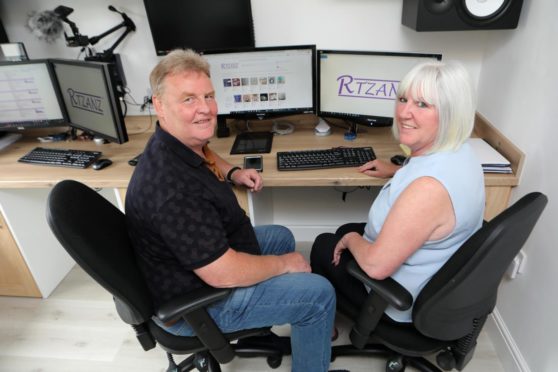 Neil and Annie Dawson in their Rtzanz office.