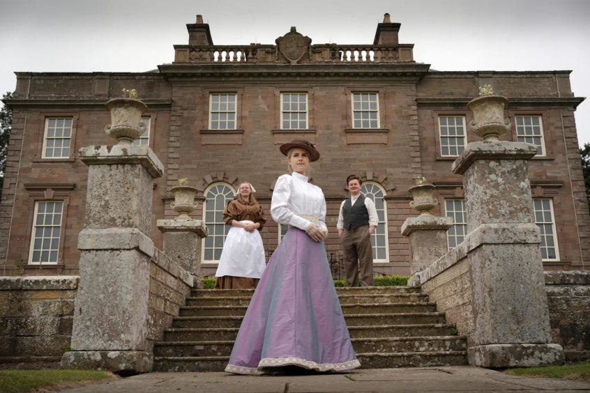 Members of the National Trust for Scotland team pictured in costume outside House of Dun.