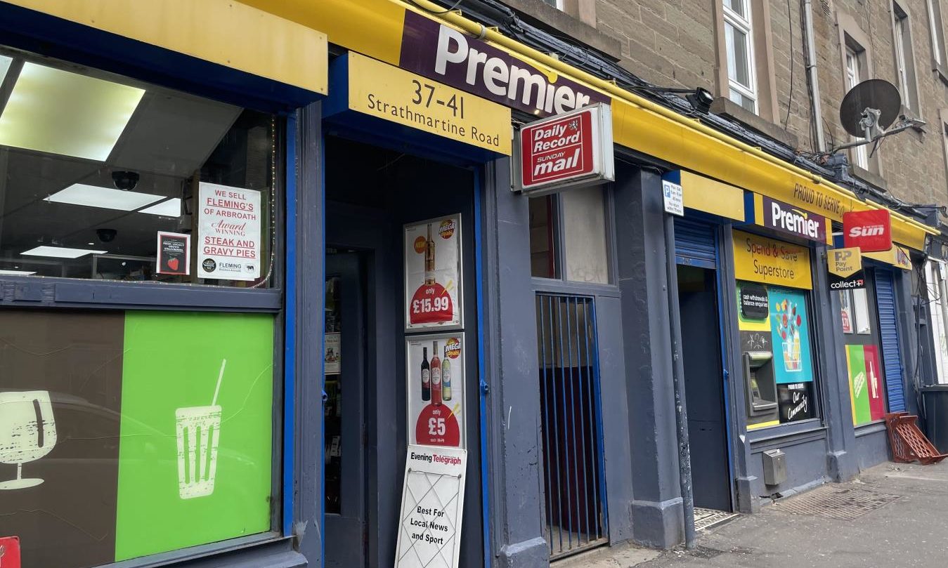 Dundee shop owner left 'upset' after racist attack