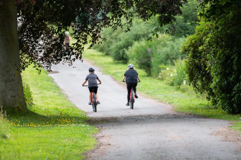 Cyclists in Monikie Country Park 