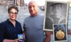 Lyn and Pete Marven reunited with their ancestor's war medal.