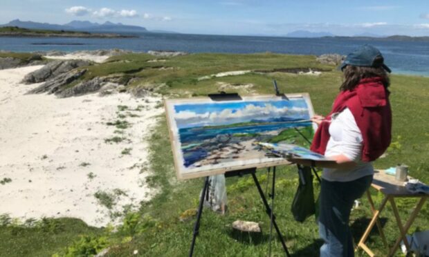 Penelope Anstice painting a recent commission at Smirisary, Glenuig