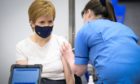 First Minister of Scotland Nicola Sturgeon receiving the first shot of the Astra Zeneca vaccine.