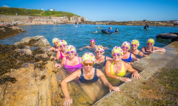 Members of the Menopausal Mermaids group enjoying the Pittenweem tidal pool.