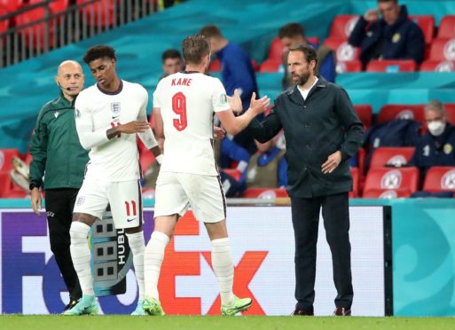 England's Marcus Rashford, Harry Kane and manager Gareth Southgate. Deserving of your support?