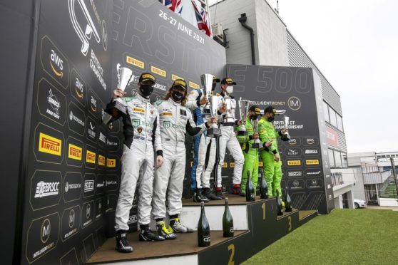 Sandy Mitchell (far left) on the Silverstone 500 podium.