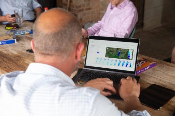 A farmer using the Sandy software.