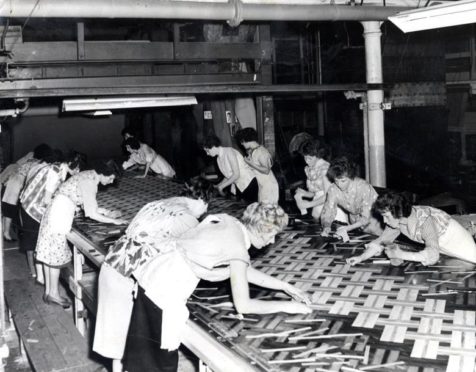 Women making inlaid linoleum, c.1960.