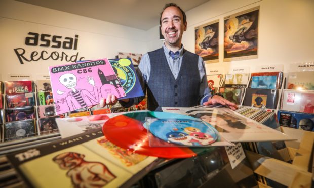 Assai record shop owner Keith Ingram with some of the records available for sale at the event last year, which was modified to take in Covid-19 restrictions.