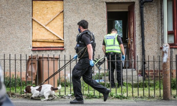 Police in Helmsdale Avenue.