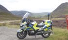 Police motorcycle on the A90