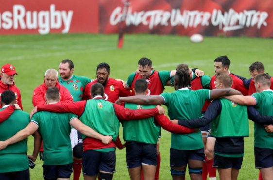 Head coach Warren Gatland leads a player huddle in Lions training this week.