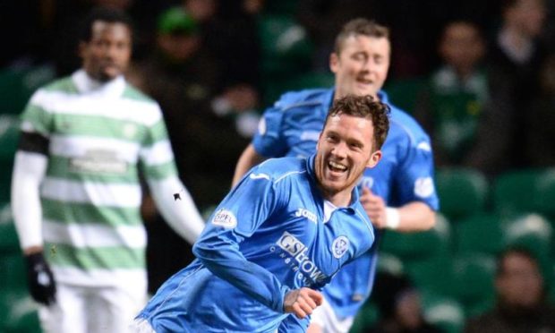 Danny Swanson celebrates his goal against Celtic.