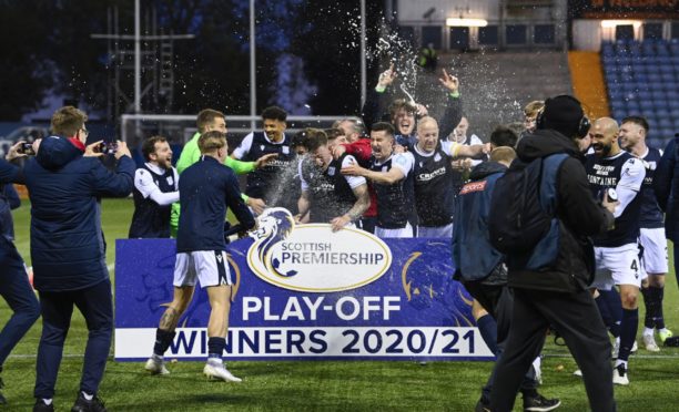 Dundee celebrate promotion in 2021. Image: SNS