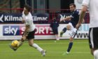 Paul McMullan fires home his second and Dundee's third.