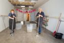 Carol Malone (left) and Pauline Lockhart in the S-Mart social supermarket which was swamped by a burst pipe. Pic: Paul Reid