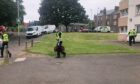 Police raided Ancrum Court in Dundee.