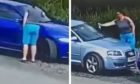 The woman was seen spraying something on the cars in Burntisland