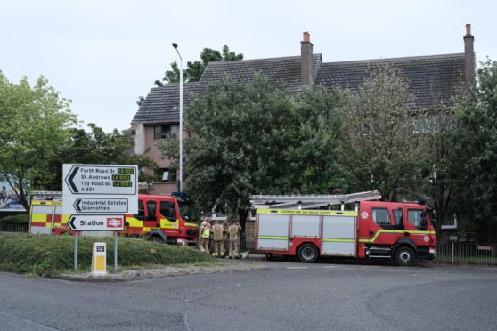 Three fire crews called to tackle blaze at a block of flats in Kirkcaldy.