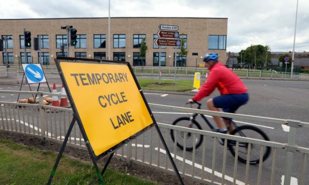 A man cycling in Arbroath