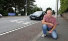 Craig at the new road markings on Perth Road.