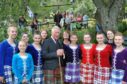 The Duke of Rothesay with Highland dancers at the 2019 Glenisla gathering.